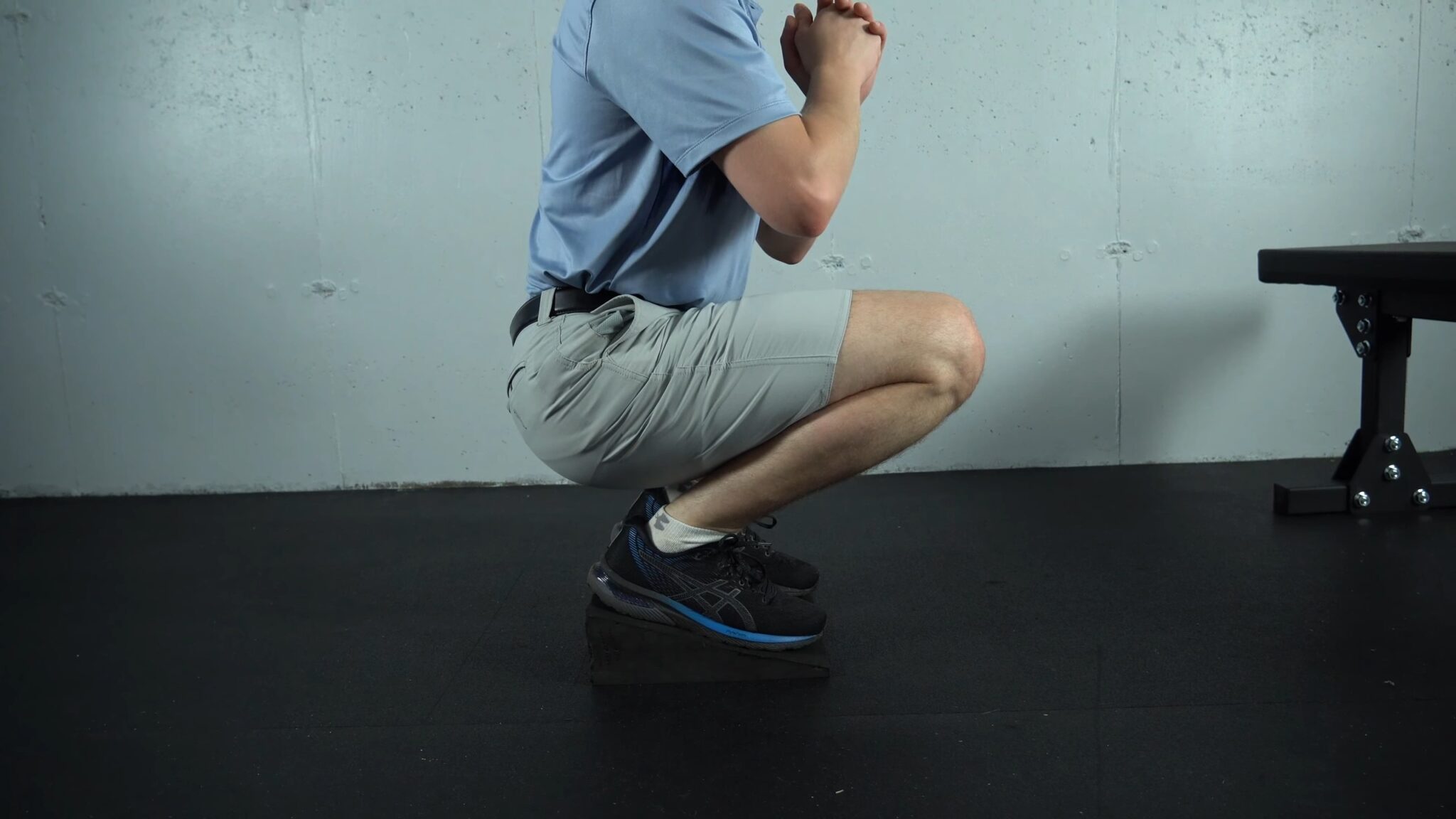 Heel Elevated Squats Benefits And Why Should You Do Them Boston Rock Gym